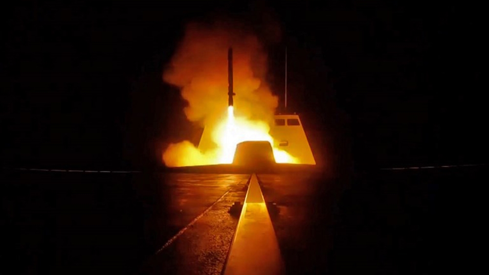 A picture released by the French Defence audiovisual communication and production unit (ECPAD) shows the launching of a cruise missile from a French military vessel in the Mediterranean sea towards ta