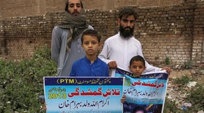 
Ikram Behram, cousin of Sarfaraz Khan, back left, went missing in August 2013 [Asad Hashim/Al Jazeera]
