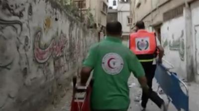 A scene from the recording Hamad shot throughout his time with paramedics during Israeli assault on Shujayea [Al Jazeera]