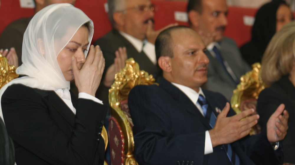 Raghad Saddam Hussein, daughter of the former Iraqi President Saddam Hussein, prays besides during a memorial services to mark the 40th day of her father''s death in Sanaa