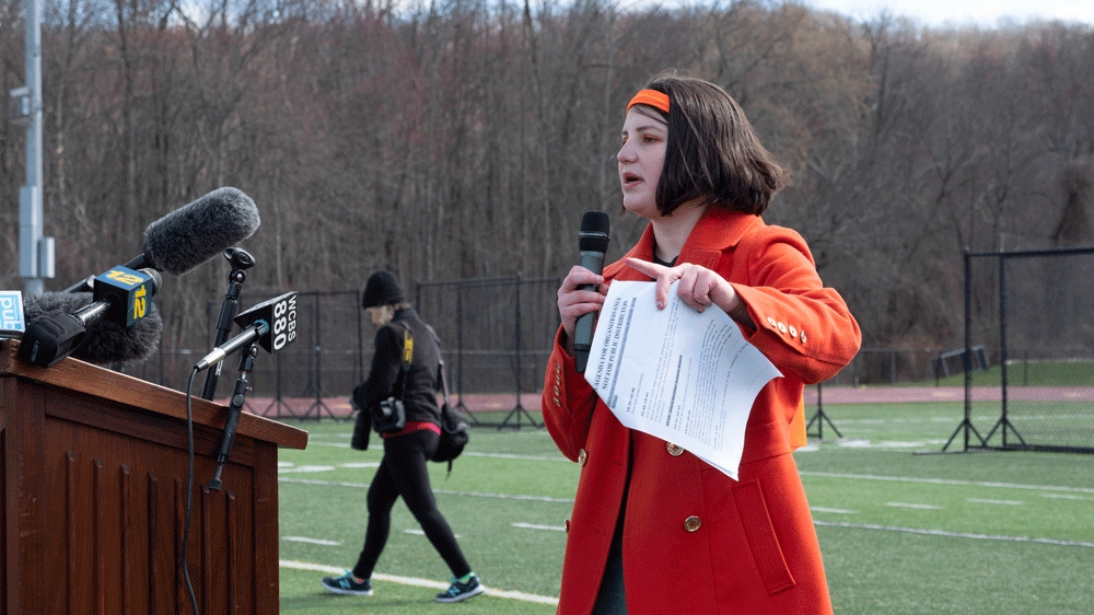 Organiser Lane Murdock speaks at Ridgefield High School [Ben Dalton/Al Jazeera]