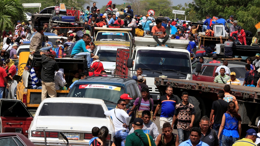 Venezuelans line up to cross into Colombia