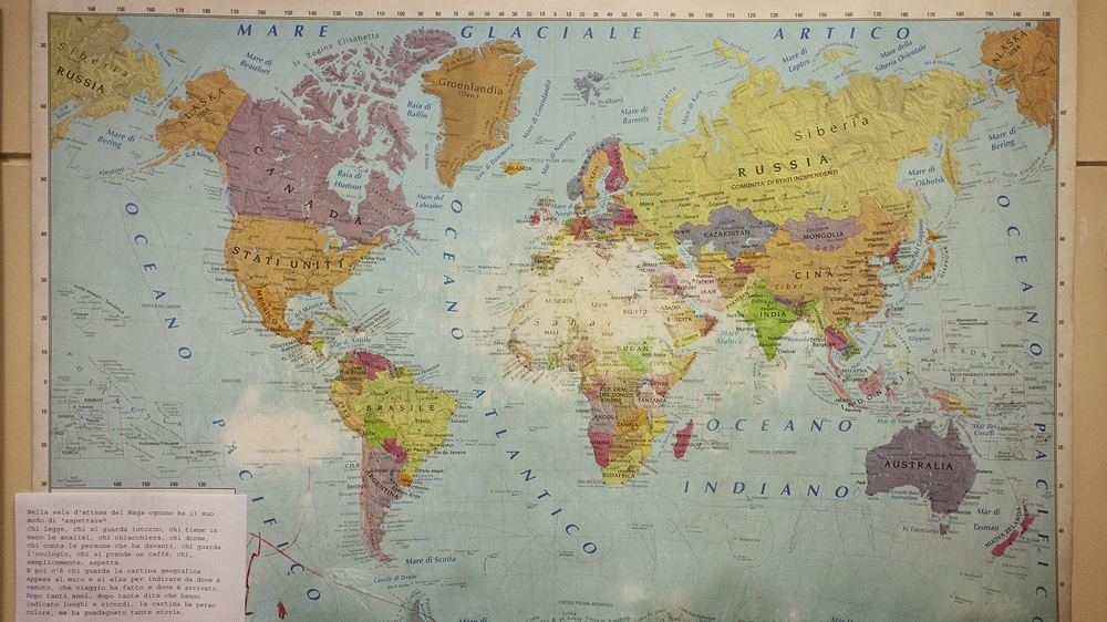 A map in Naga's waiting room illustrates migration flows to the EU during the last decade [Alessio Perrone/Al Jazeera]