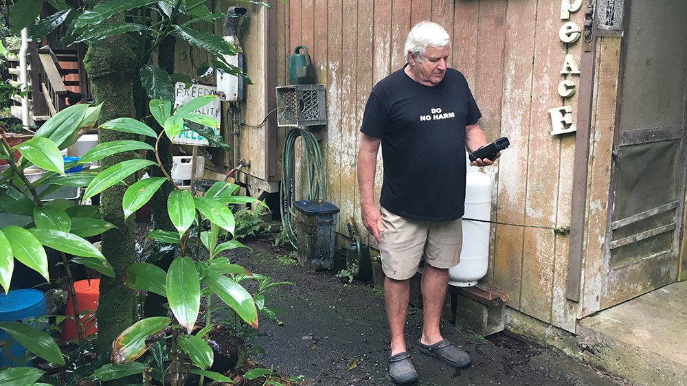 Albertini holds a weekly peace vigil in the town of Hilo [Jon Letman/Al Jazeera]