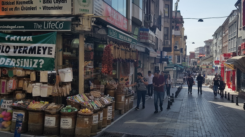 Economy Minister Nihat Zeybekci has vowed faster growth for the rest of 2018 [Umut Uras/Al Jazeera]