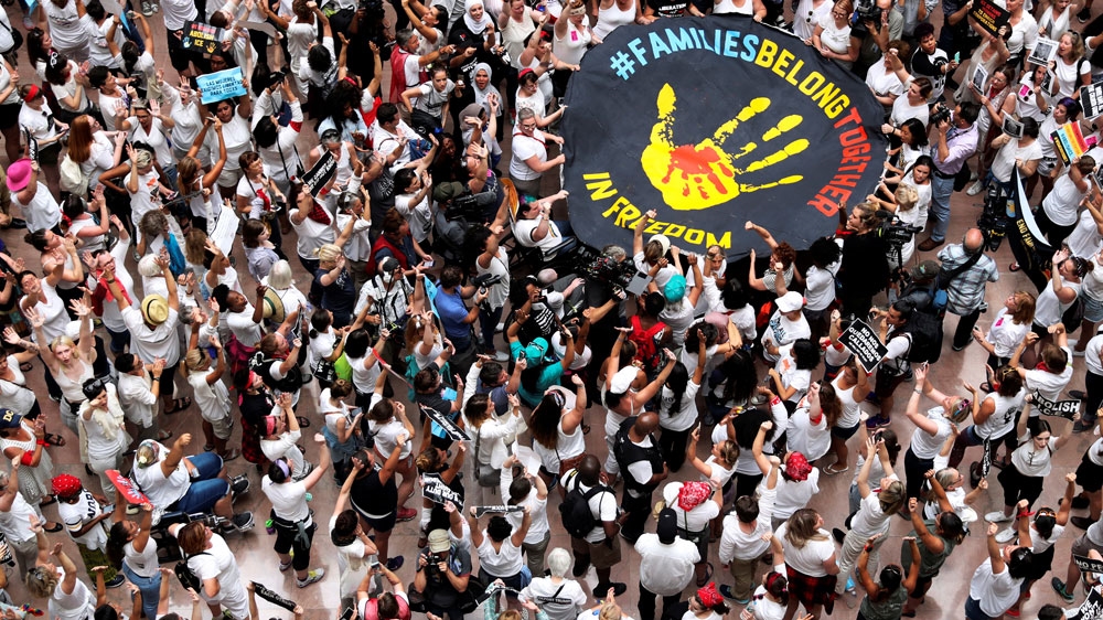 Demonstrators calling for 'an end to family detention', rally at the Hart Senate Office Building on Capitol Hill [Jonathan Ernst/Reuters]
