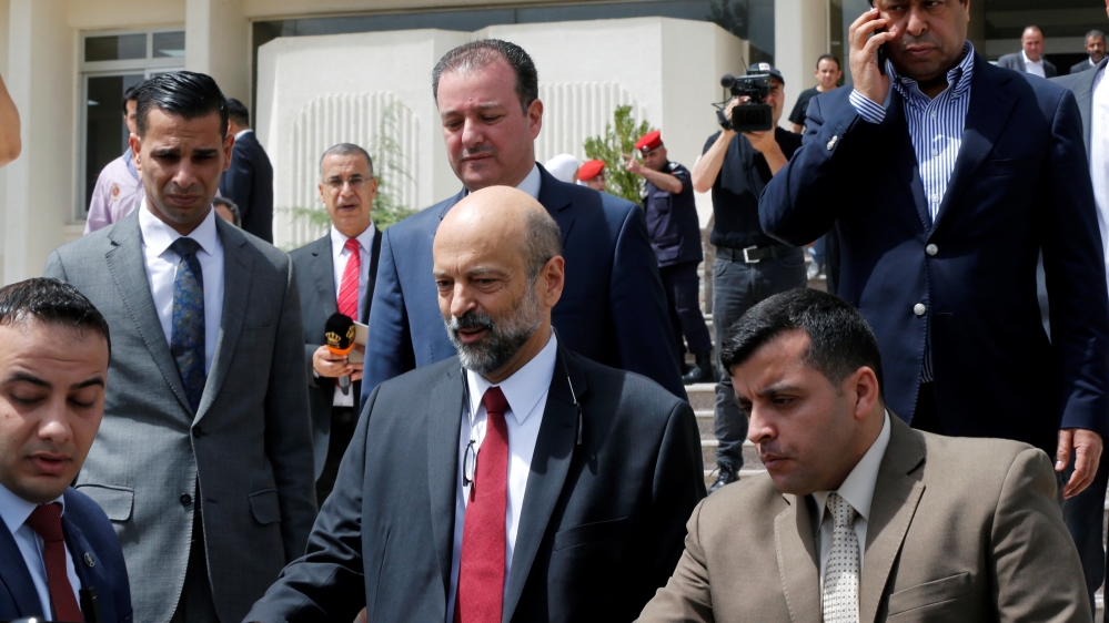 Jordan''s designated new prime minister Omar al-Razzaz leaves the Parliament building in Amman, Jordan