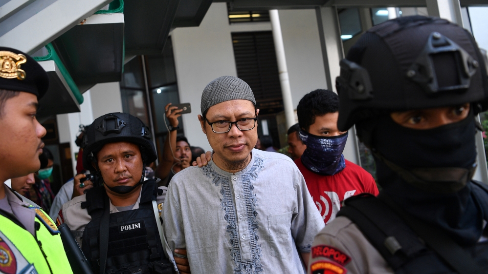 A chief of Jemaah Ansharut Daulah (JAD), the country''s largest Islamic State-linked group, arrives for his trial at South Jakarta court in Jakarta