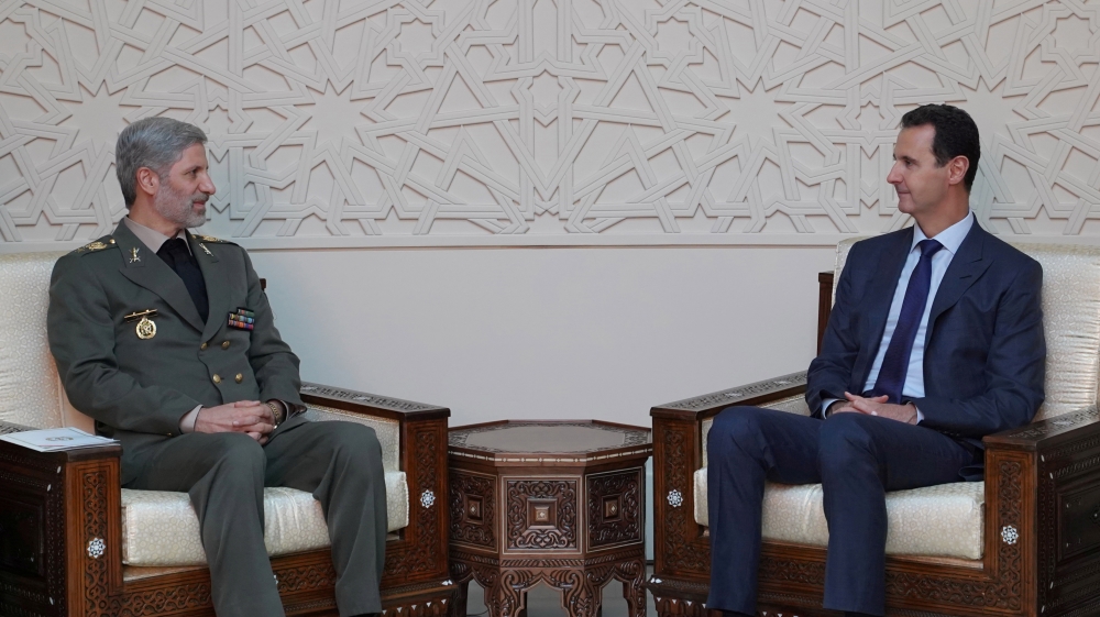 Syrian President Bashar al Assad meets with Iranian Defence Minister Amir Hatami in Damascus