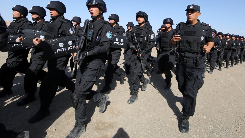 China Uighurs soldiers Reuters