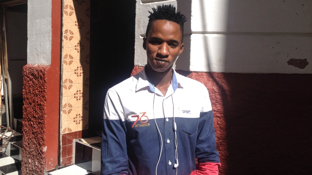 Mohammed Jallo, 16, fled Sierra Leone seeking safety at the age of 13 after his parents were killed [Joe Wallen/Al Jazeera]