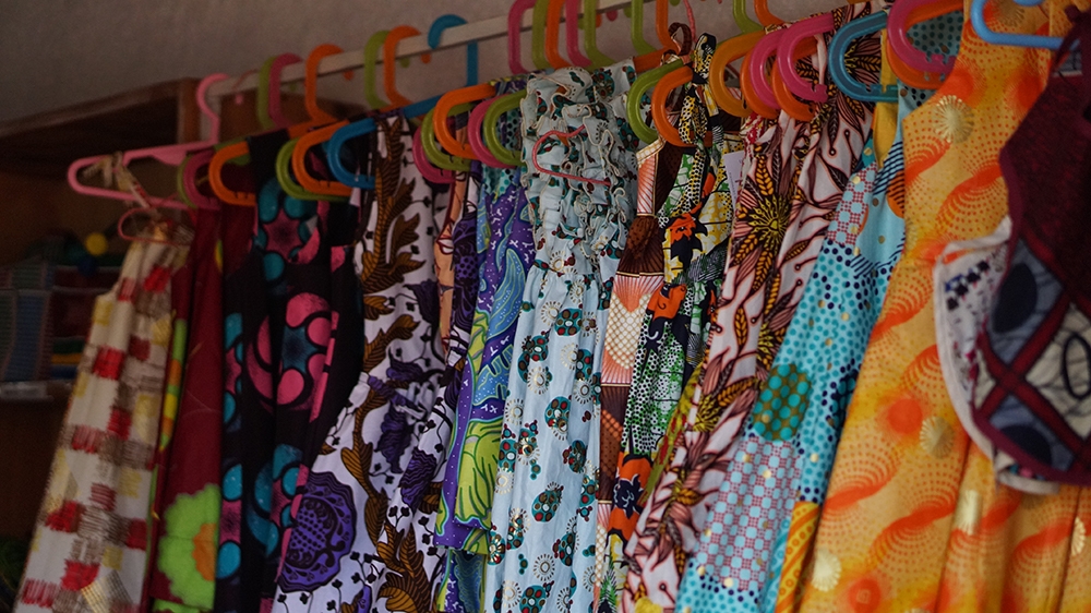 Women at the NWC cooperative manufacture clothes, accessories and homeware  [Azad Essa/Al Jazeera]