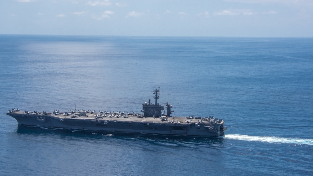 The aircraft carrier USS Carl Vinson transits the Indian Ocean
