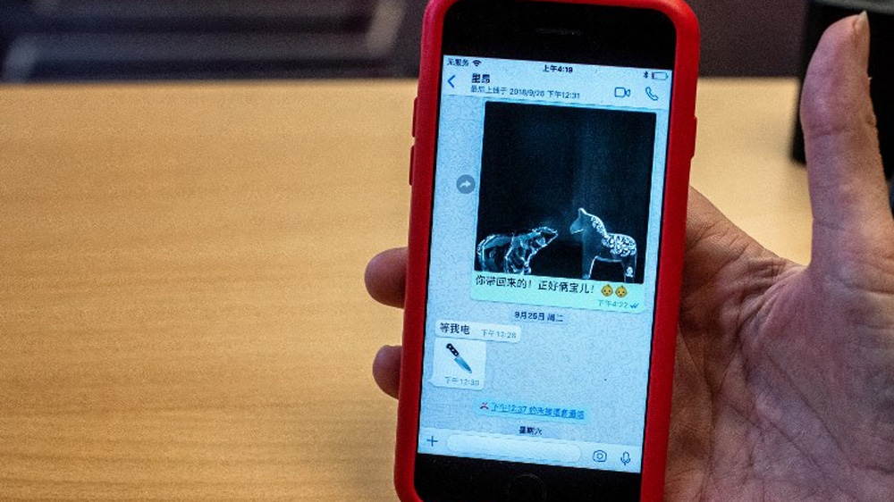 Grace Meng said her husband's disappearance placed her 'in great danger' [Jeff Pachoud/AFP]