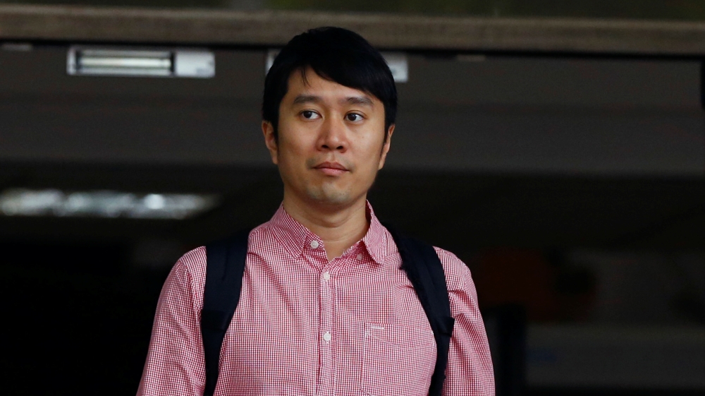 Civil rights activist Jolovan Wham leaves the State Court after a hearing in Singapore