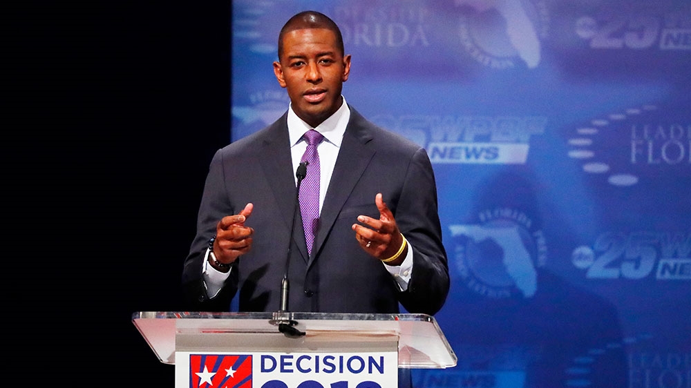 Florida Democratic gubernatorial candidate Andrew Gillum gestures as he debates Republican Ron DeSantis [Wilfredo Lee//Reuters]