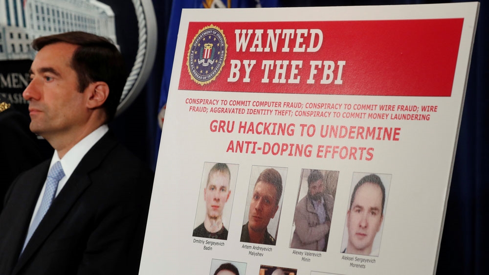 US Assistant Attorney General for the National Security Division John Demers announced the indictment of seven Russian military officers [Kevin Lamarque/Reuters]