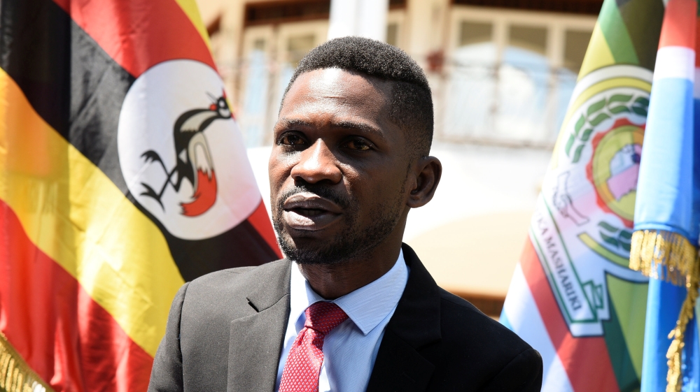 Ugandan musician turned politician, Robert Kyagulanyi also known as Bobi Wine addresses a news conference at his home in Kampala