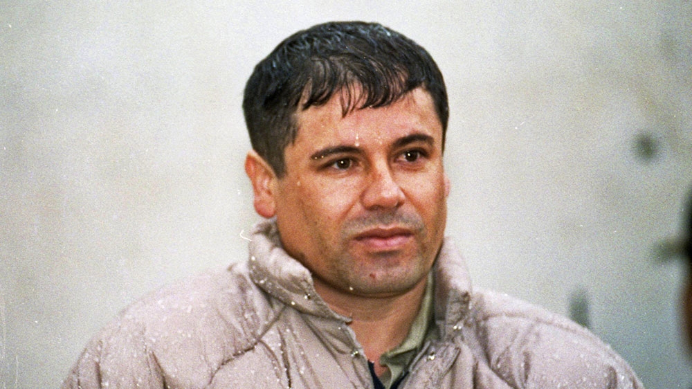 Joaquin Guzman Loera, alias 'El Chapo' Guzman is shown to the press after his 1993 arrest at the high-security prison of Almoloya de Juarez, outskirts of Mexico City [File: Damian Dovarganes/AP Photo]
