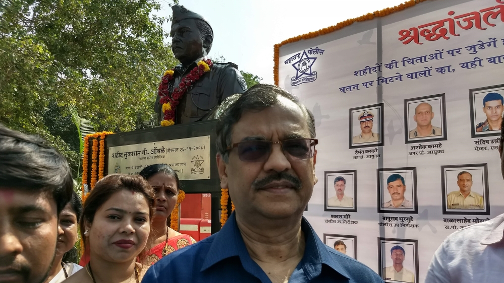Nikam at the memorial of policeman Tukaram Omble, who was killed while apprehending Ajmal Kasab [Priyanka Borpujari/Al Jazeera]