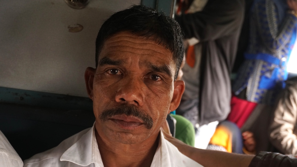 
Jitendra Ibadh took a loan to build a compound wall to keep stray cattle from destroying his field. Like thousands of others, he is joining the protest march in New Delhi to seek a waiver [Shone Satheesh/Al Jazeera]

