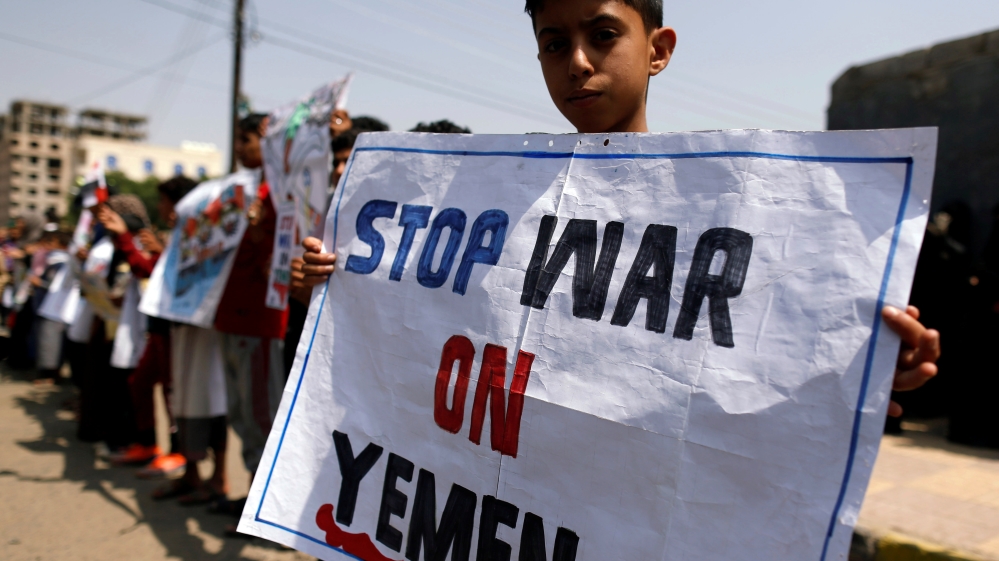 Boy holds a placard as he demonstrates outside the offices of the United Nations in Sanaa, Yemen to denounce last week''s air strike that killed dozens including children