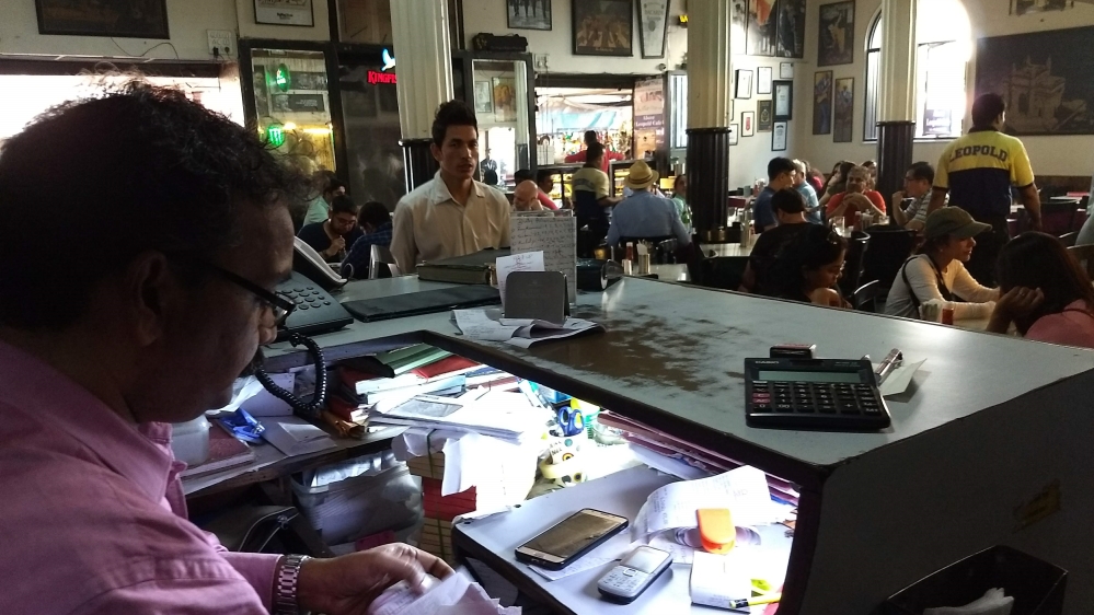 Coelho at the cafe, a popular joint which is bustling even on a weekday [Priyanka Borpujari/Al Jazeera]