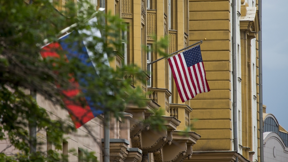 U.S. and Russian flags hung at the U.S. Embassy in Moscow, Russia, Friday, July 28, 2017. Russia''s Foreign Ministry on Friday ordered a reduction in the number of U.S. diplomats in Russia and said it
