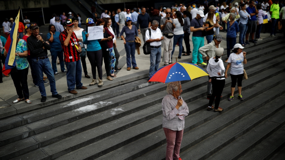 The demonstration comes one week after opposition leader Juan Guaido declared himself president [Carlos Barria/Reuters]