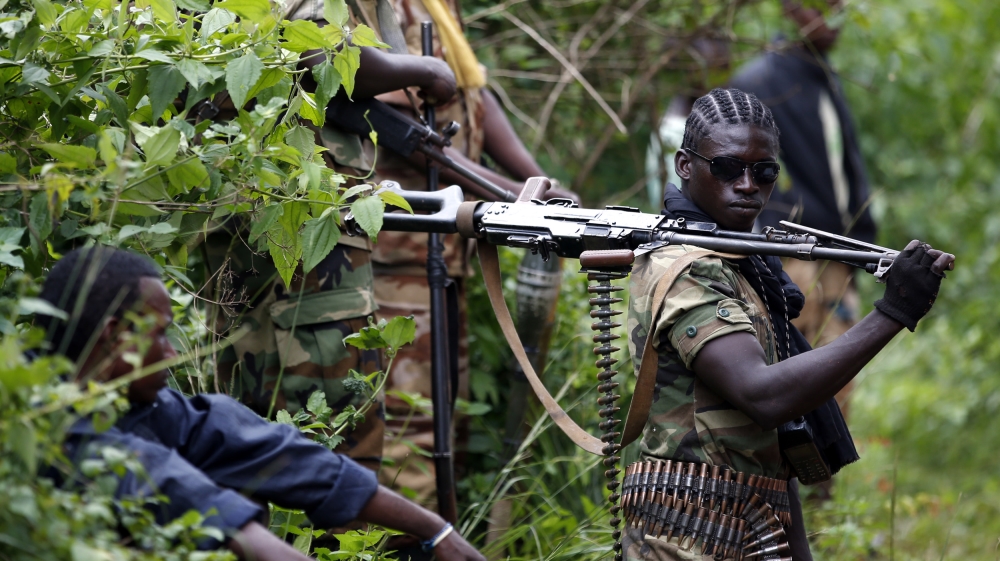 Seleka fighter holds his machine gun near the town of Kuango