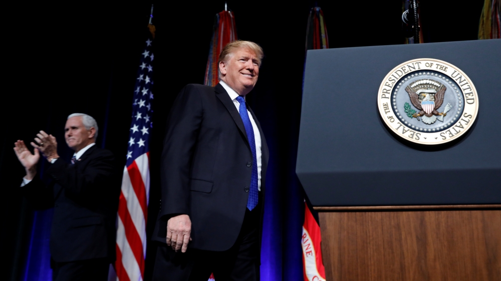 U.S. President Trump is introduced by Vice President Pence as he arrives at Missile Defense Review announcement at the Pentagon in Arlington, Virginia