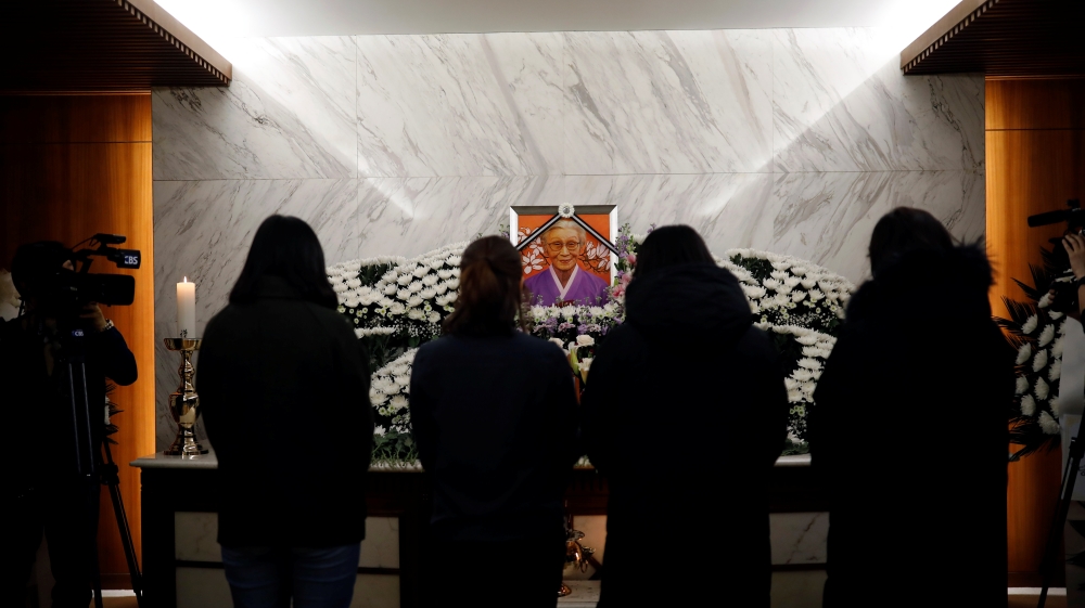 People mourn at the funeral of former South Korean "comfort woman" Kim Bok-dong in Seoul