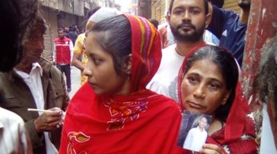Sultana's father Jainal has been missing since the time the fire broke out [Faisal Mahmud/Al Jazeera]