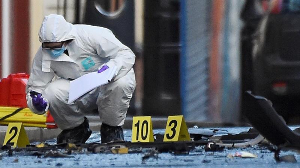 A forensic officer inspects the scene of a suspected car bomb in Londonderry, Northern Ireland January 20, 2019 [File: Clodagh Kilcoyne/Reuters]