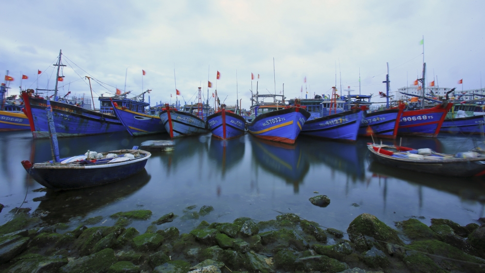 
Vietnamese fishing boats have been targeted by Chinese coastguard vessels in disputed waters for years [File: Hau Dinh/AP Photo]
