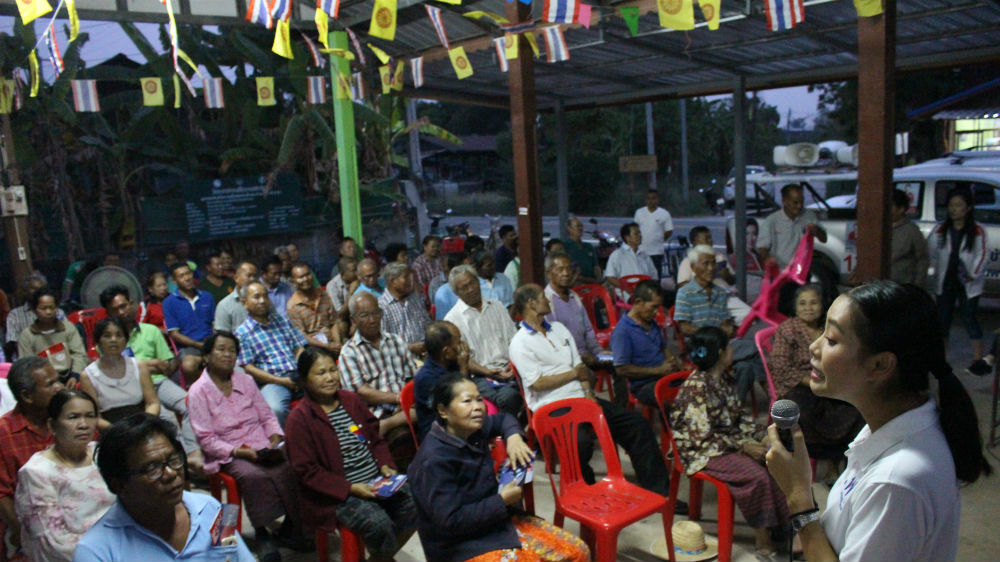 Saratsanun Unnopporn, a candidate for Pheu Thai, campaigns at a village in northeastern Thailand [Hathairat Phaholtap/Al Jazeera] 