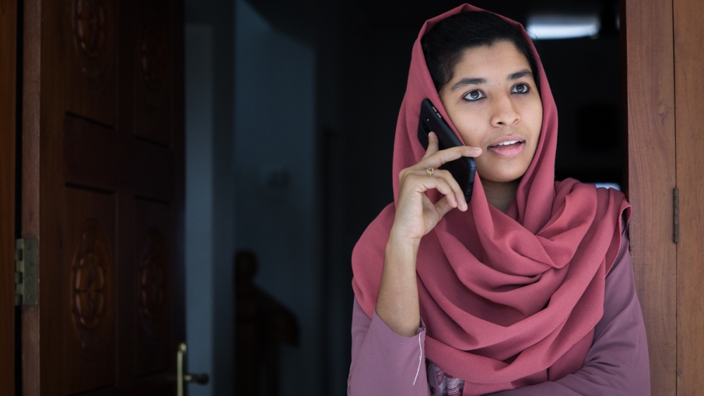 Shahanas Ibrahim's husband runs a construction business in Qatar. 'Every time he leaves me to return to Qatar, I cry,, she says [Sebastian Castelier/Al Jazeera]