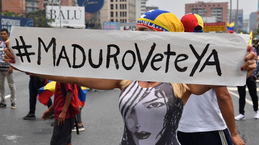 Guaido's supporters held banners saying 