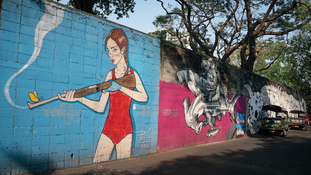 Street art is more prolific in Bangkok since Thailand's military took power in a coup in 2014. [101 East/Al Jazeera]