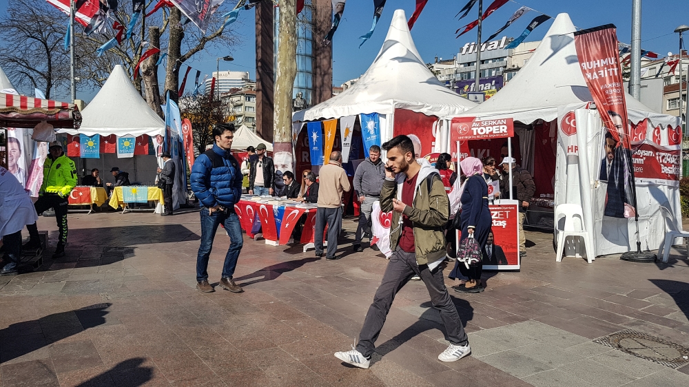 Political parties have set up stalls in the squares and streets of Istanbul [Umut Uras/Al Jazeera]