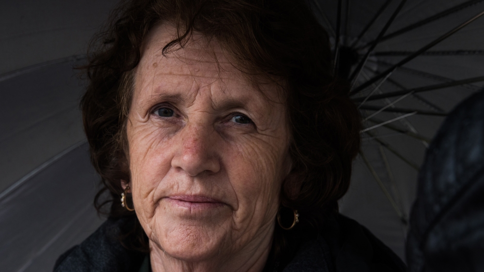 Nife Alijaj at the Meja memorial complex on the 20th anniversary of the massacre. Her husband Sali was killed in Meja on April 27, 1999 [Valerie Plesch/Al Jazeera]