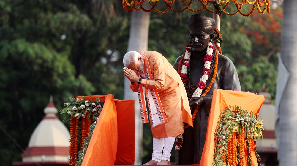 India's Hindu nationalist PM Narendra Modi during a roadshow in Varanasi [Adnan Abidi/Reuters]