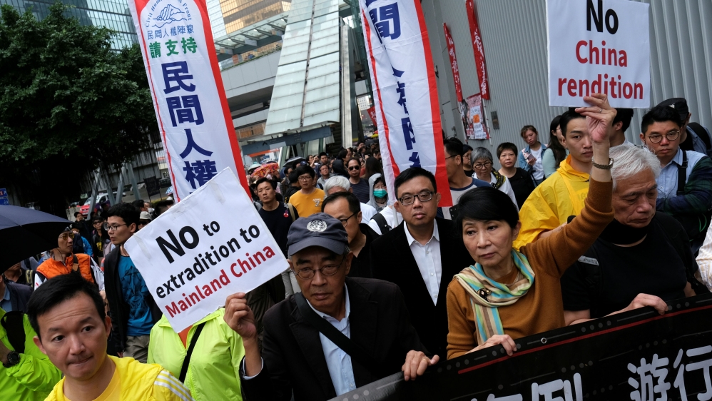 Demonstrators march during a protest to demand authorities scrap a proposed extradition bill with China, in Hong Kong, China March 31, 2019. REUTERS/Tyrone Siu