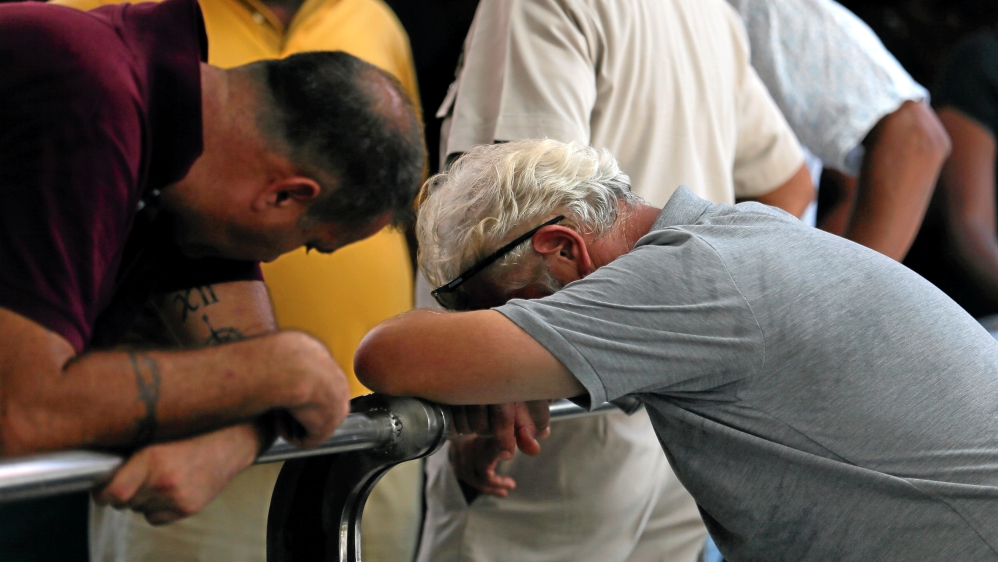 Foreign relatives of a victim of a blast react at the police mortuary in Colombo, Sri Lanka [Dinuka Liyanawatte/Reuters]