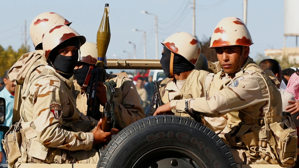 Military forces look on in North Sinai
