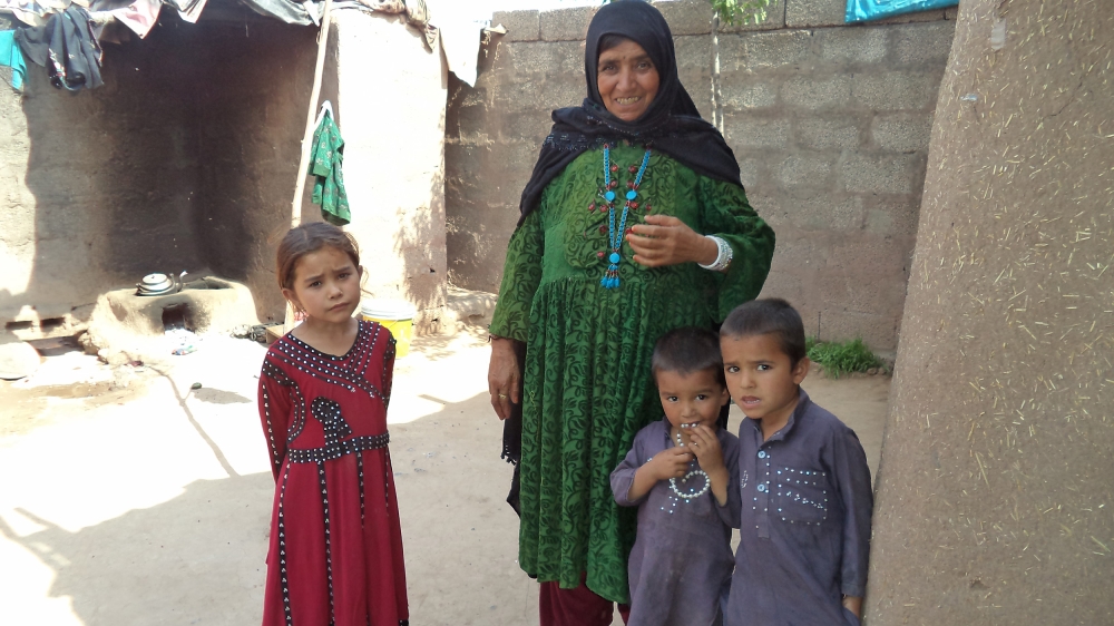 Khor Bibi's husband was killed in a blast and said she would fear for her family's safety if they were to be repatriated [Mahwish Qayyum/Al Jazeera]