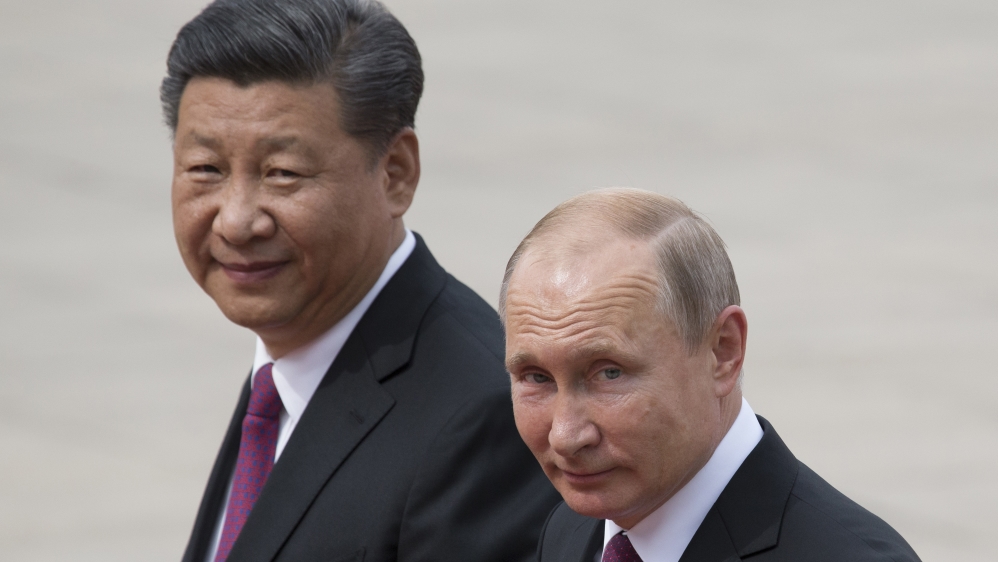 Russian President Vladimir Putin, right, and Chinese President Xi Jinping