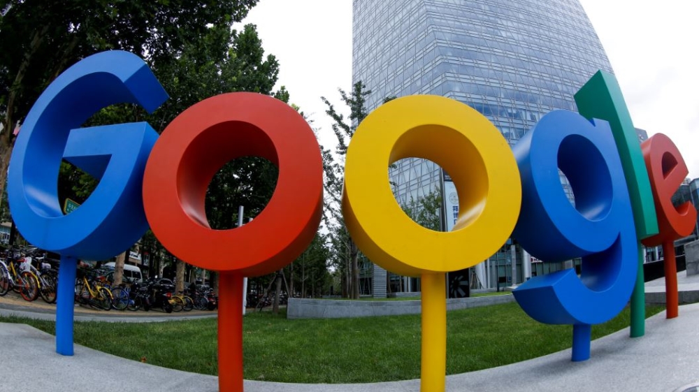 FILE PHOTO: The brand logo of Alphabet Inc''s Google is seen outside its office in Beijing