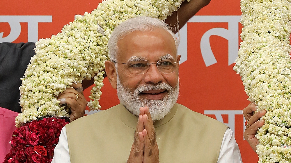 Bhartya Janta party (BJP) leader and Indian Prime Minister Narendra Modi (L) greets at the party headquarters in New Delhi, India 21 May 2019. According to the exit polls prediction Narendra Modi is s