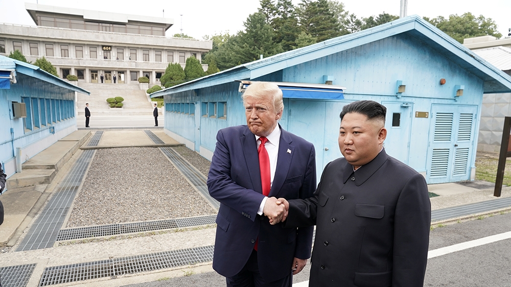 U.S. President Donald Trump meets with North Korean leader Kim Jong Un at the demilitarized zone separating the two Koreas, in Panmunjom, South Korea, June 30, 2019. REUTERS/Kevin Lamarque -